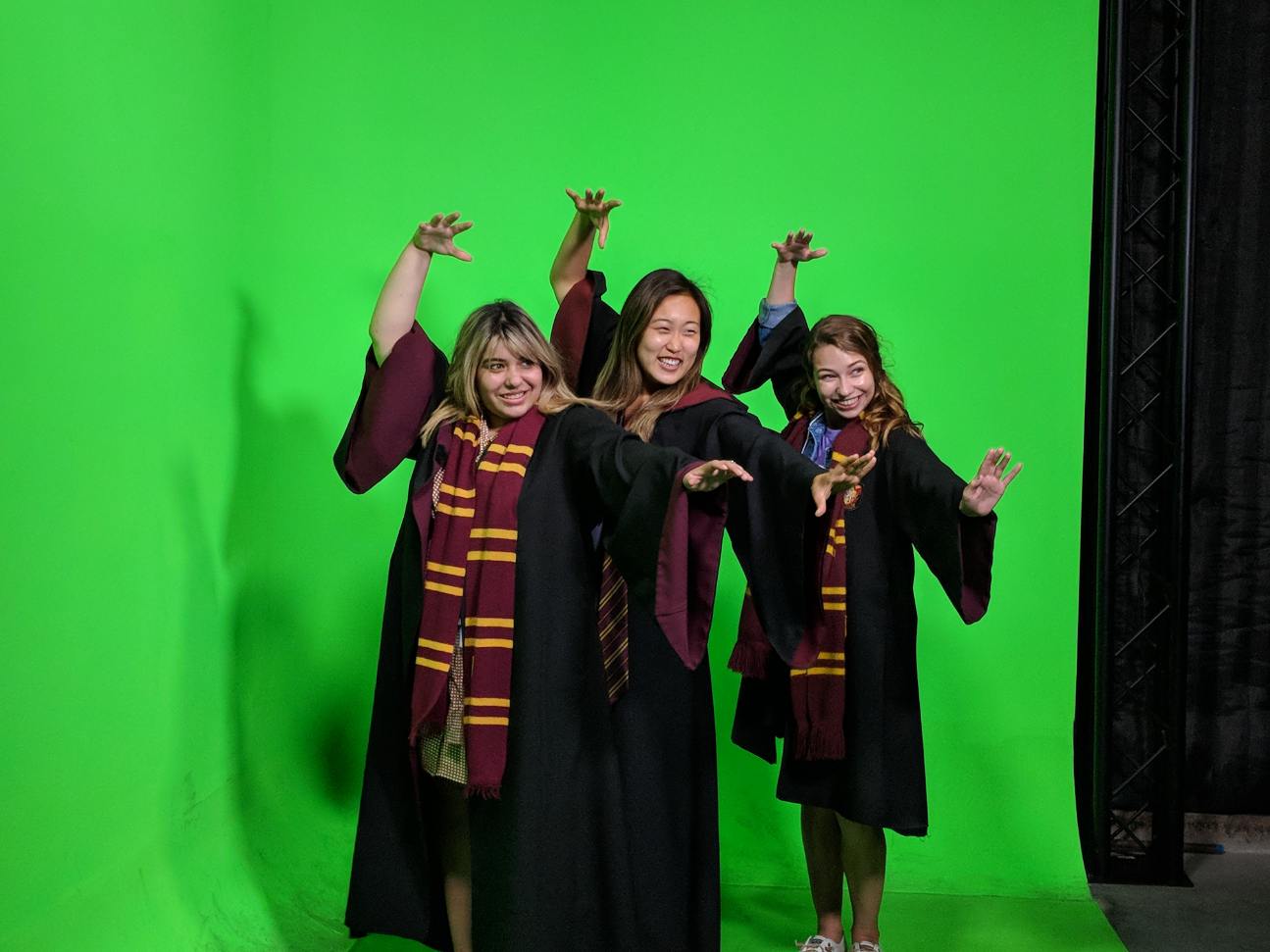 Teaching team in front of the Harry Potter Studio greenscreen