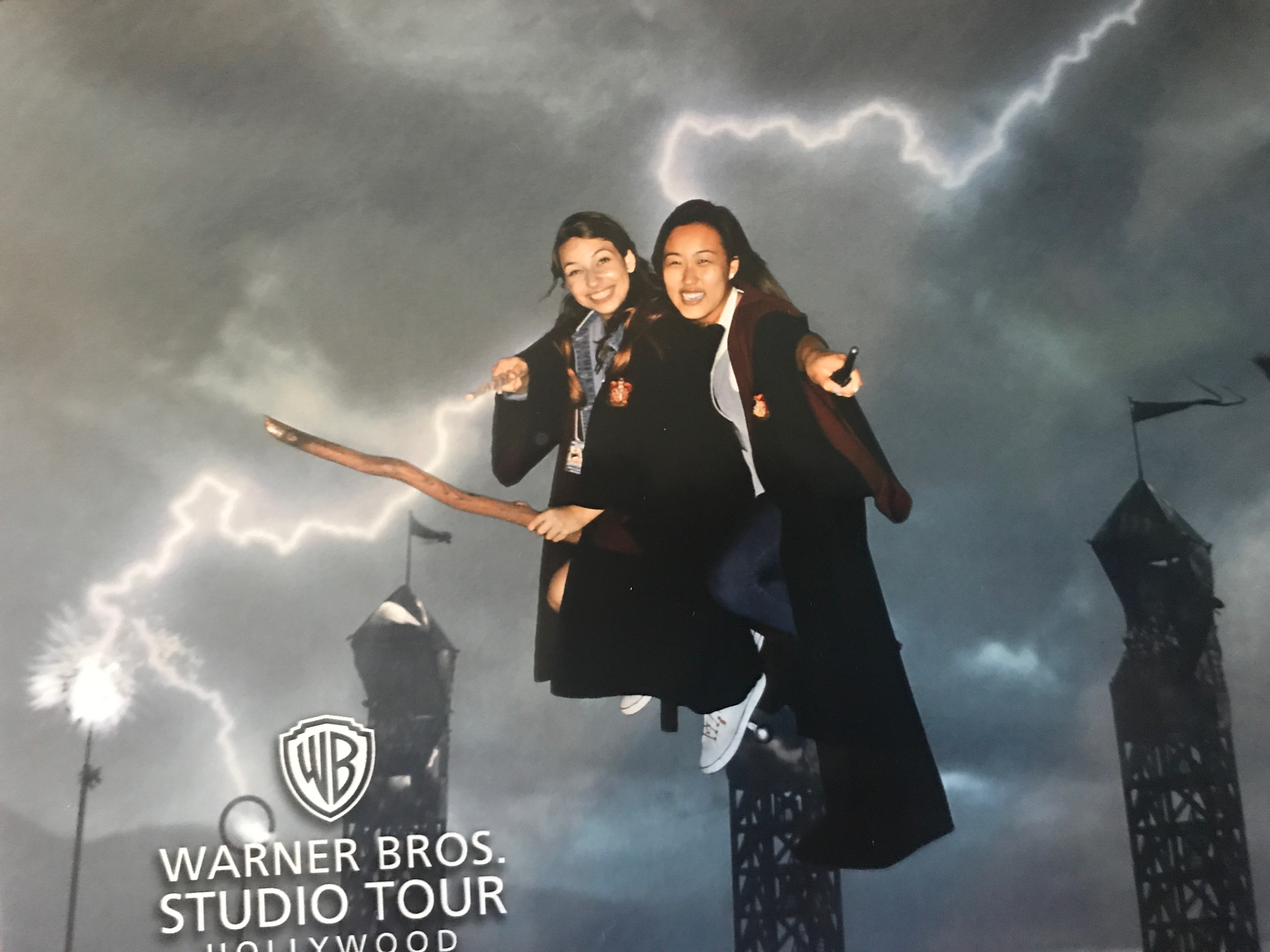 TAs taking Harry Potter Studio Photos flying on a broom